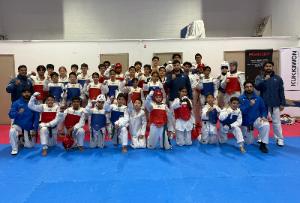 Panthers squad in sparring kit at the Kukkiwon hall